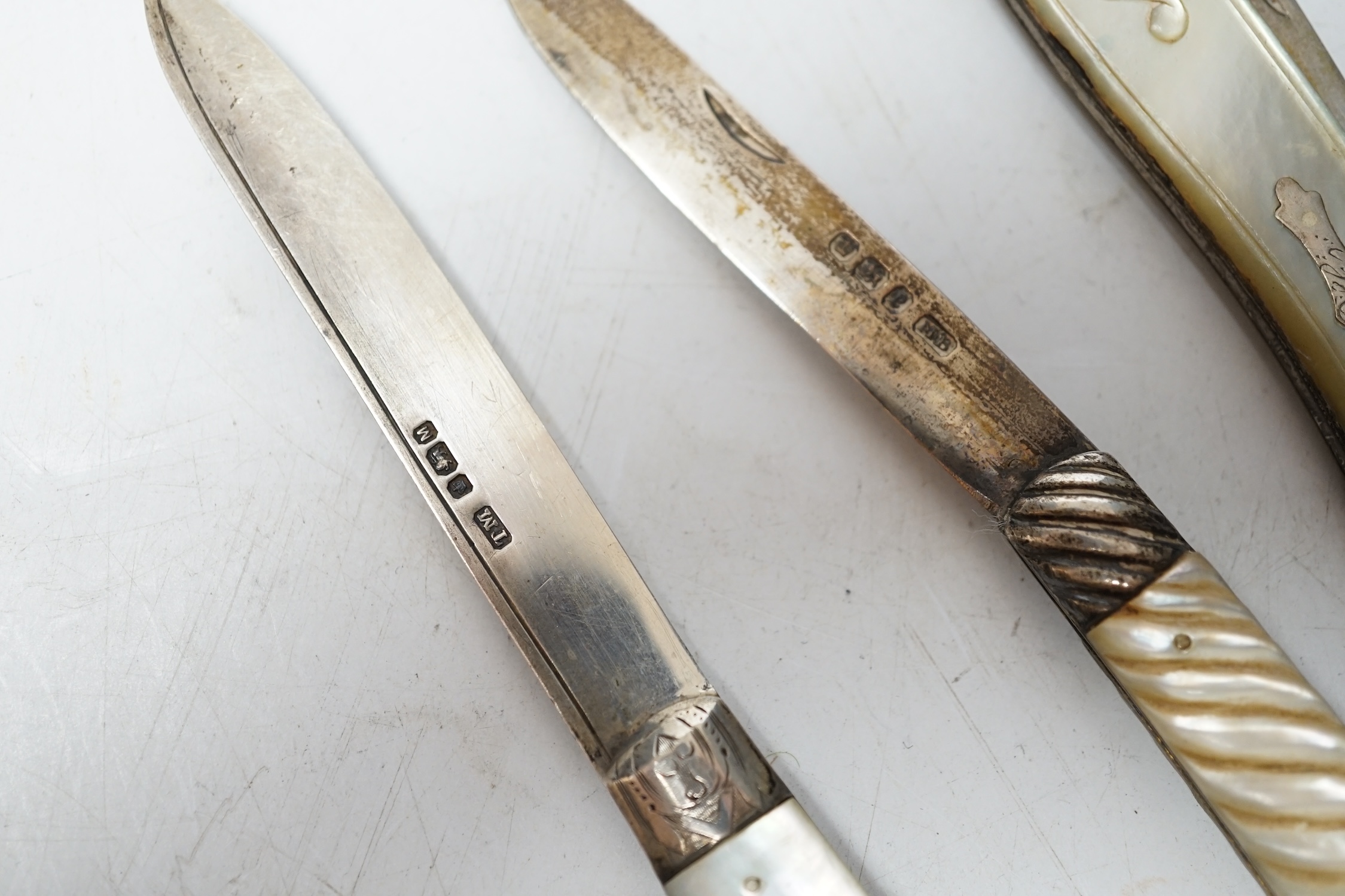 Four assorted Victorian silver and mother of pearl fruit knives, largest Francis Clark, Birmingham, 1843, 90mm. Condition - fair.